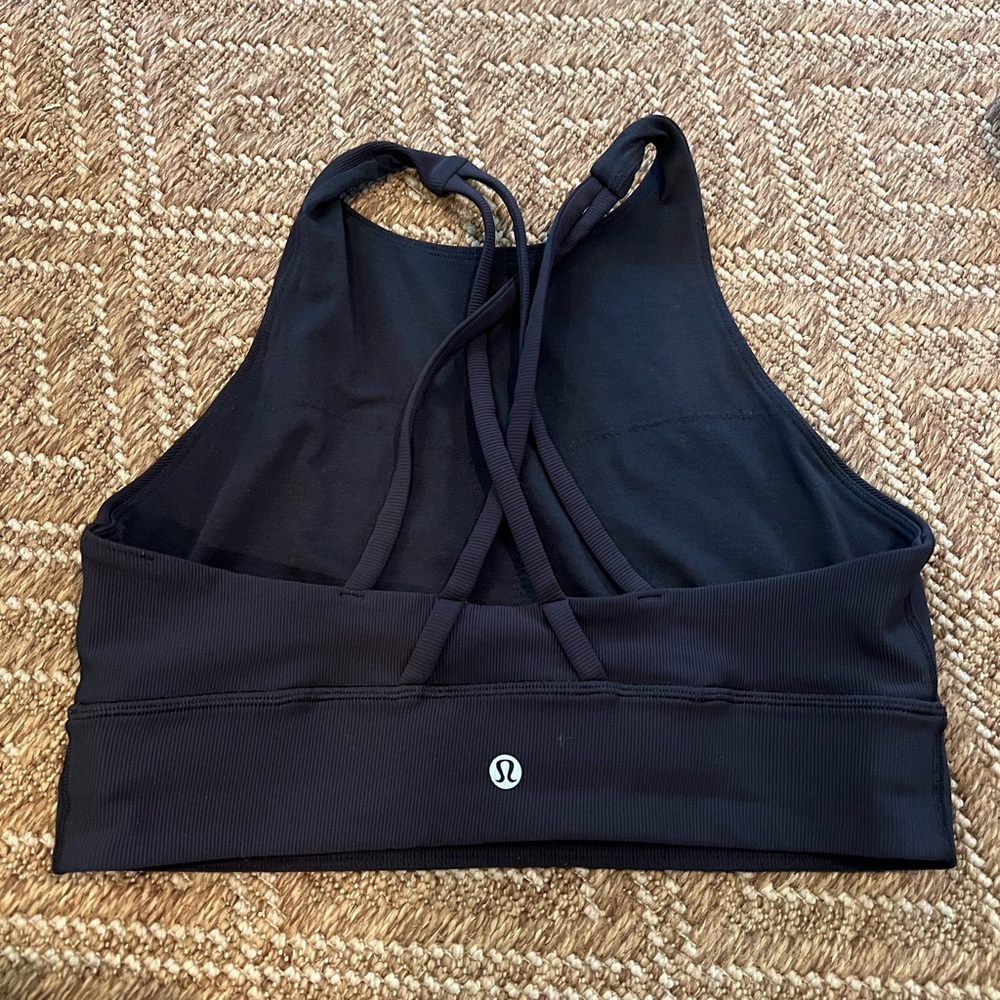 New without tags.  Black. Lululemon high neck sports bra